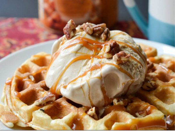 closeup of waffle with vanilla ice cream